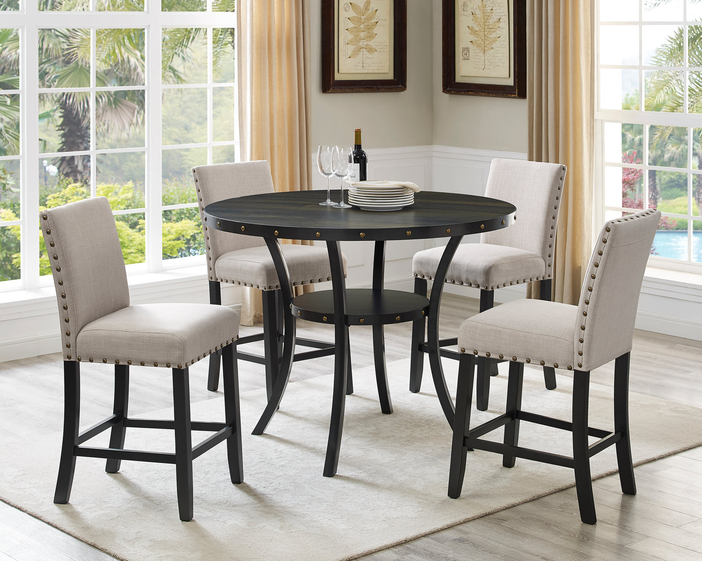 Dark wood round dining table with four upholstered counter stools