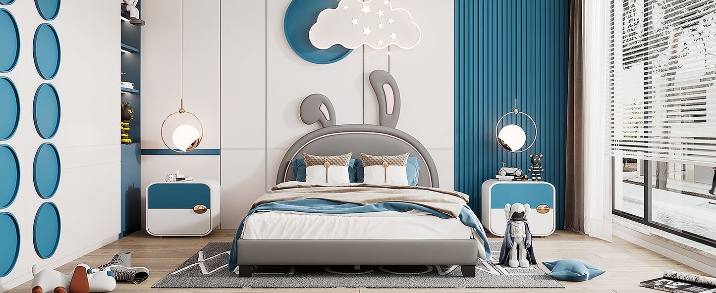 Modern grey upholstered kids bed with bunny ear headboard and blue accents