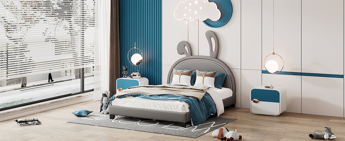 Grey upholstered kids bed with bunny ears headboard