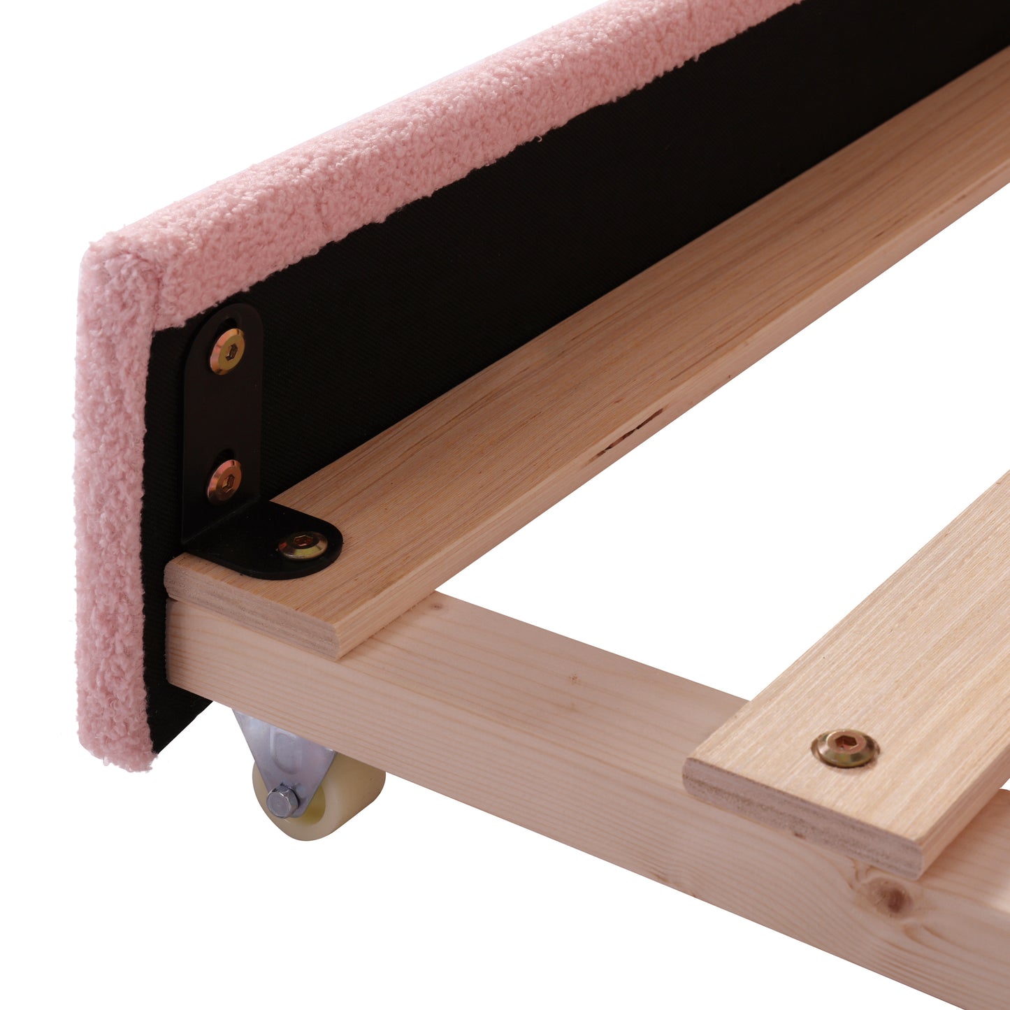 Pink fluffy upholstered bed frame corner detail with wooden slats and caster wheel