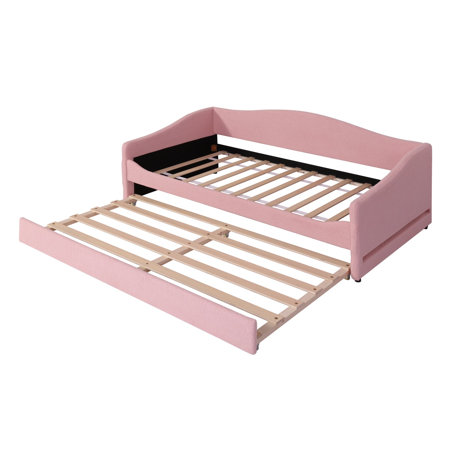 Pink upholstered twin daybed with pullout trundle