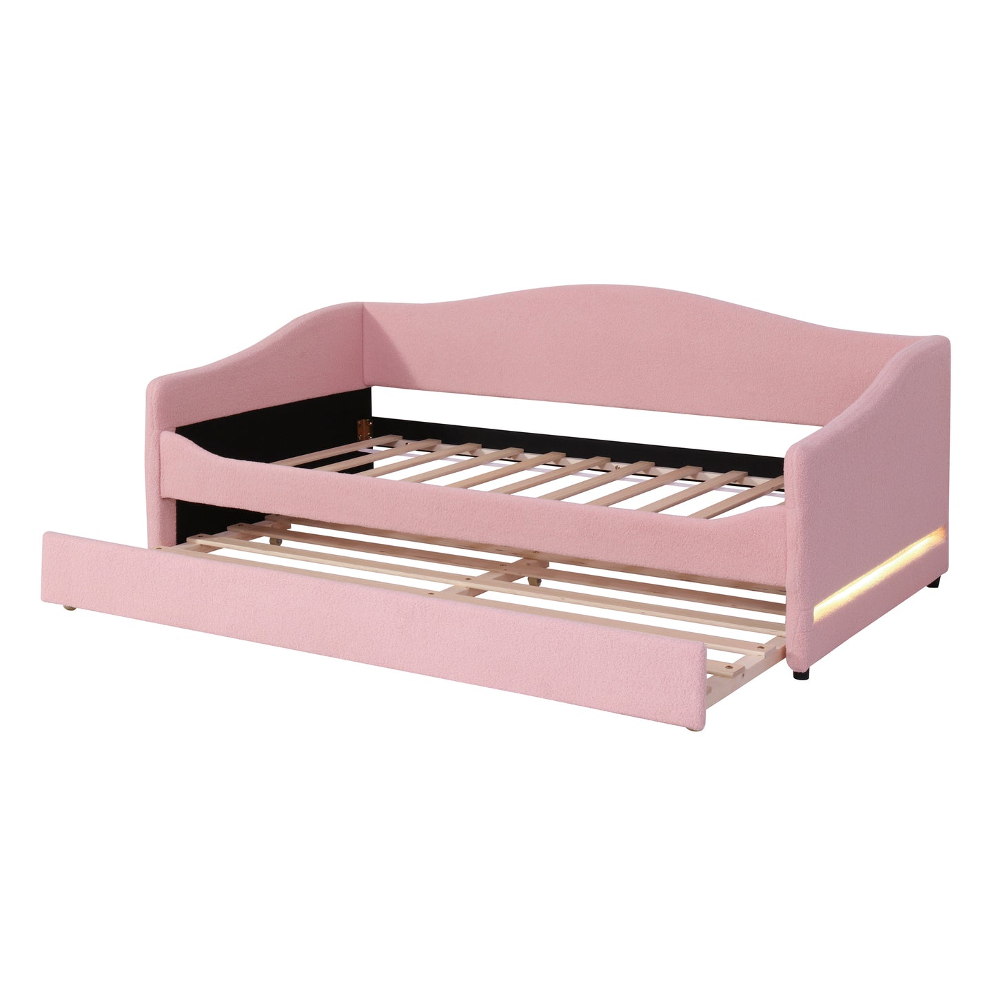 Pink upholstered daybed with pullout trundle and LED lighting
