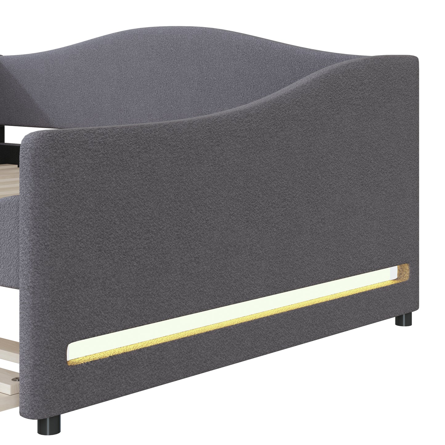 Grey upholstered bed frame detail with integrated LED lighting strip
