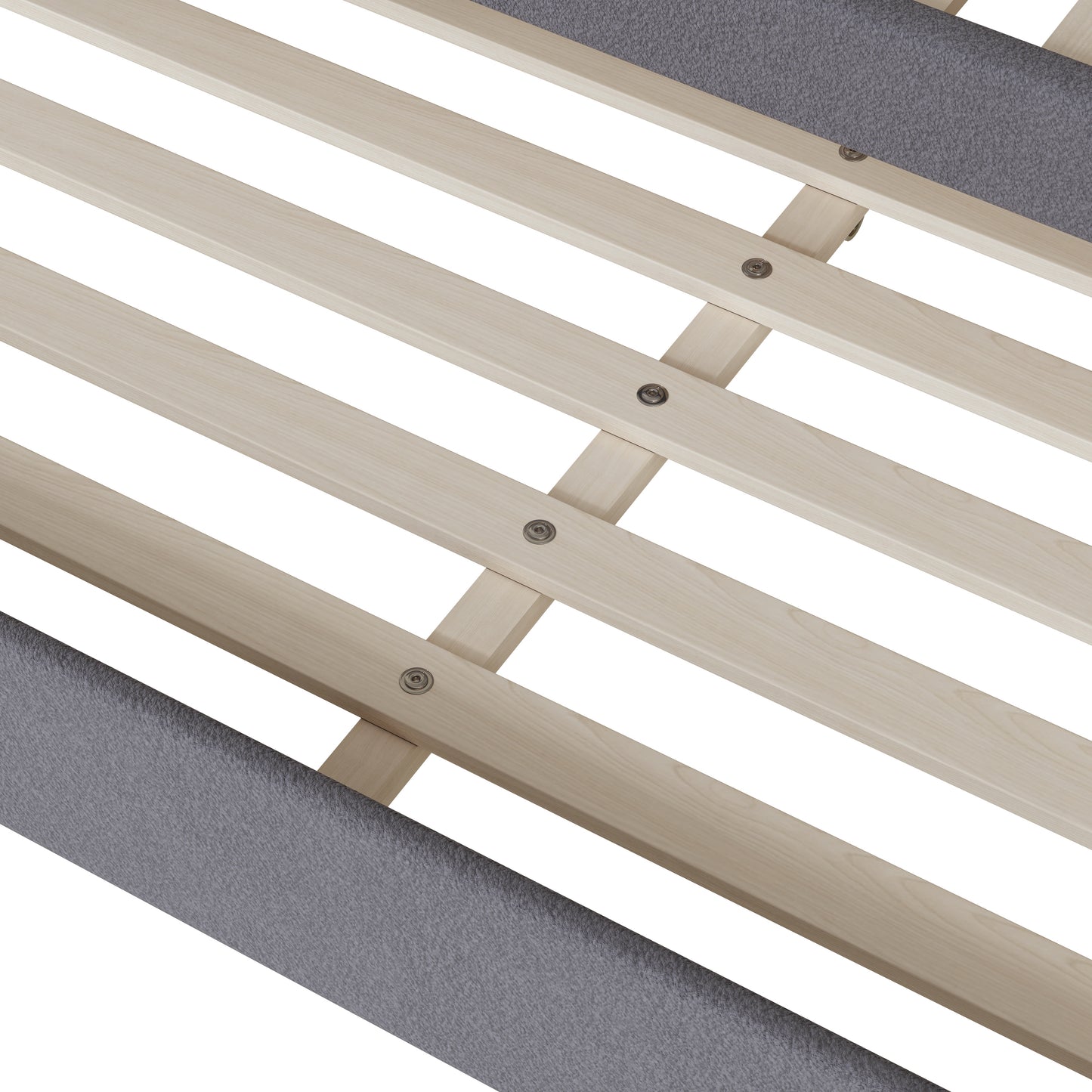 Closeup of natural wood bed slats with grey fabric border