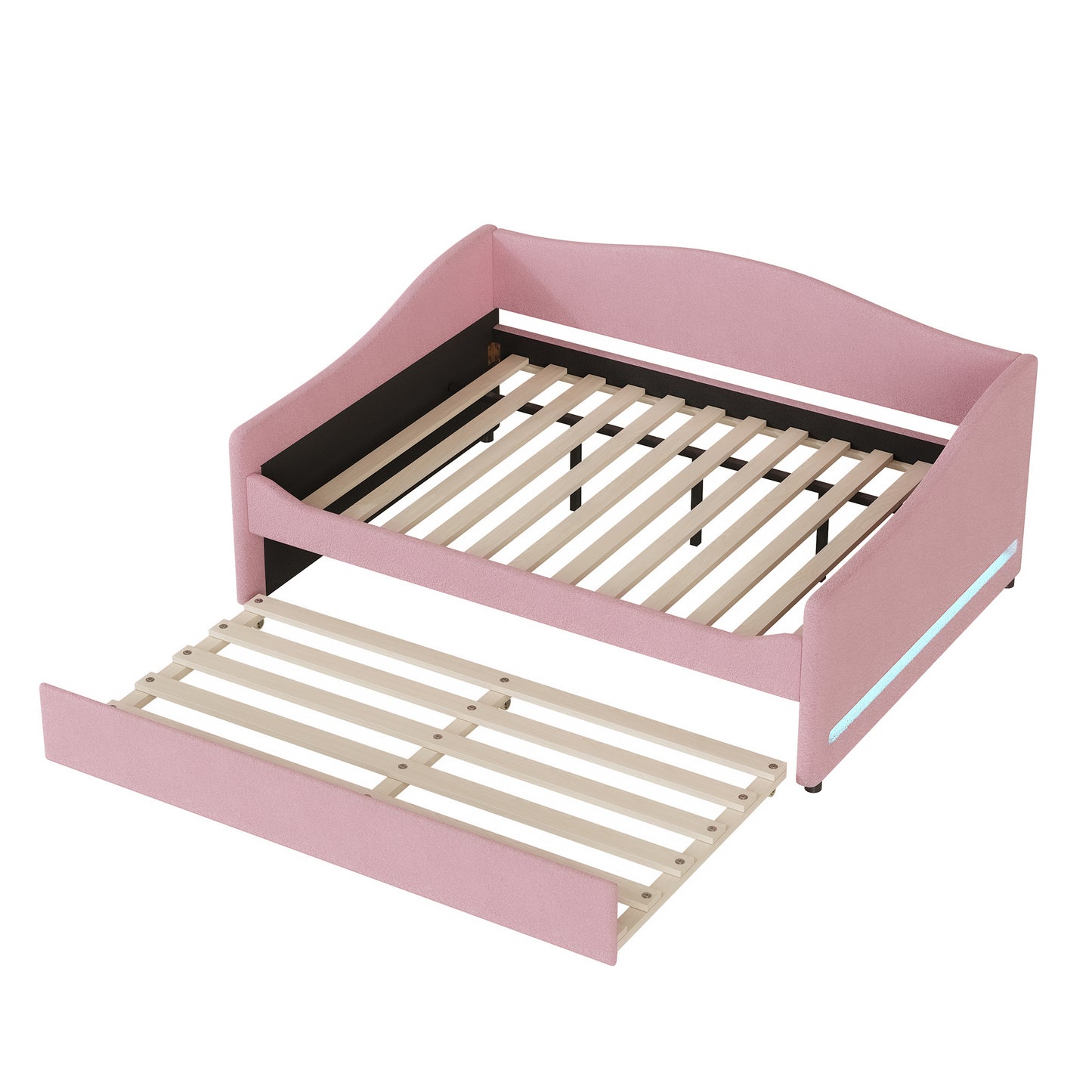 Pink upholstered daybed with pullout trundle and integrated LED lighting