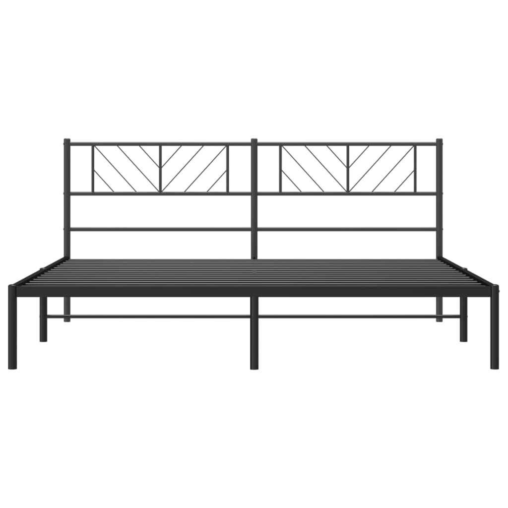 Black metal bed frame with geometric headboard and white mattress