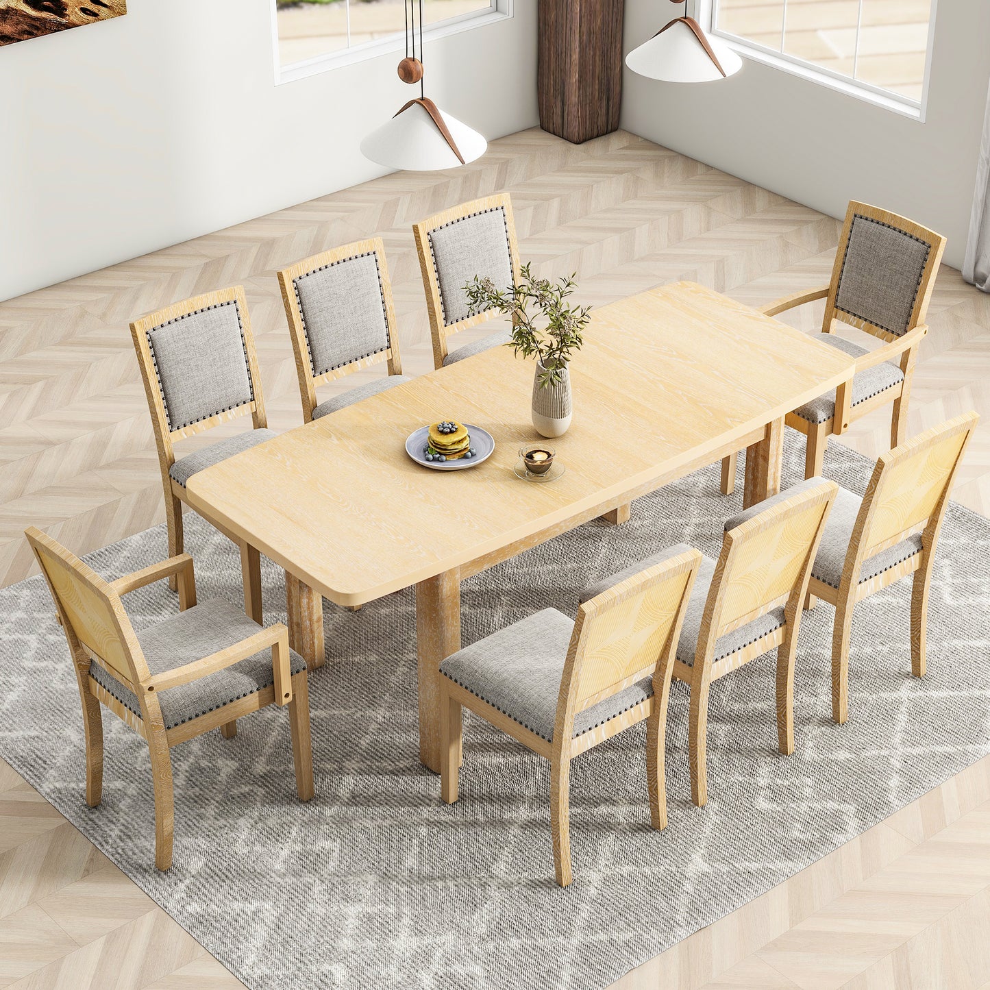 Light oak dining set with eight upholstered chairs around a central table