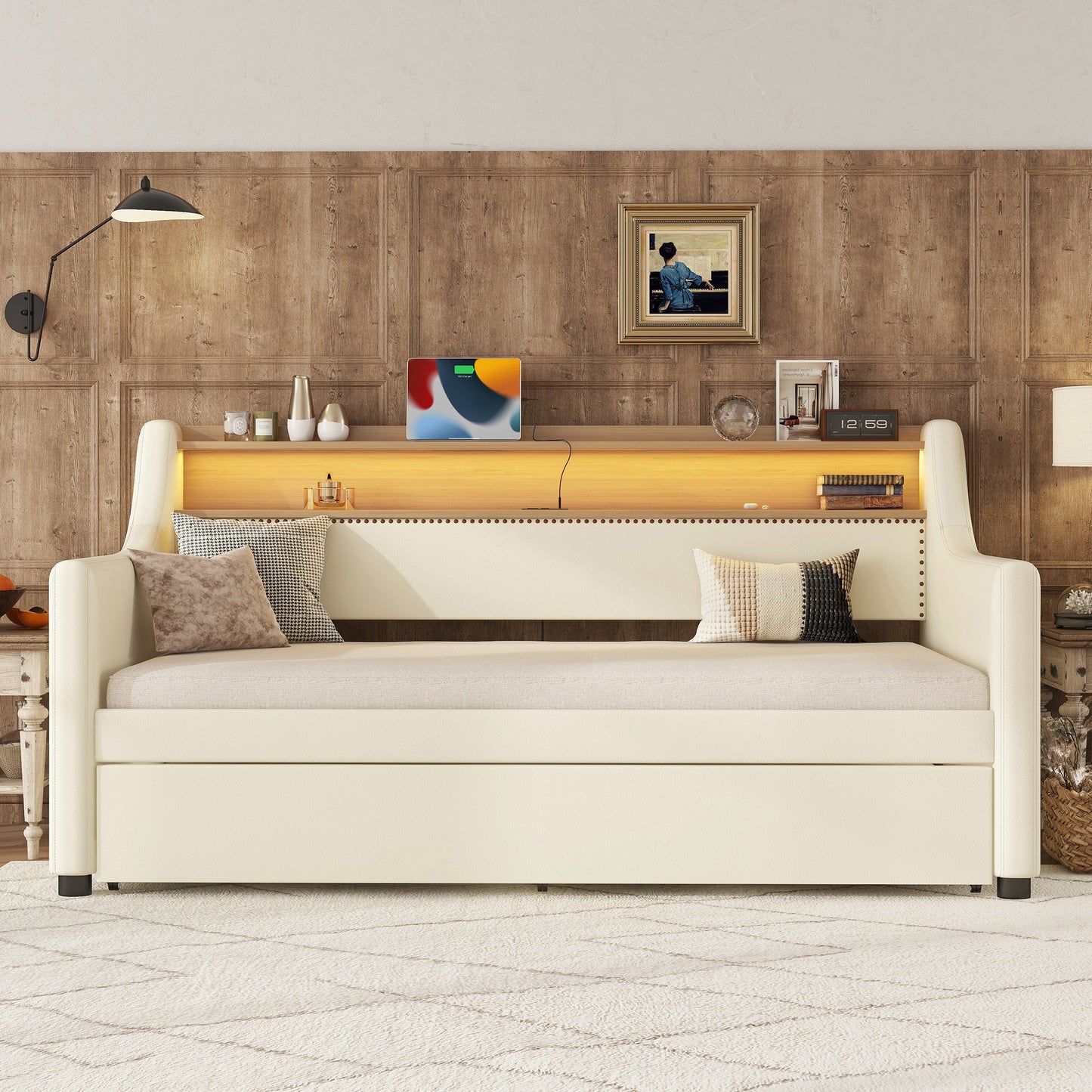 Cream upholstered daybed with builtin shelving and LED lighting