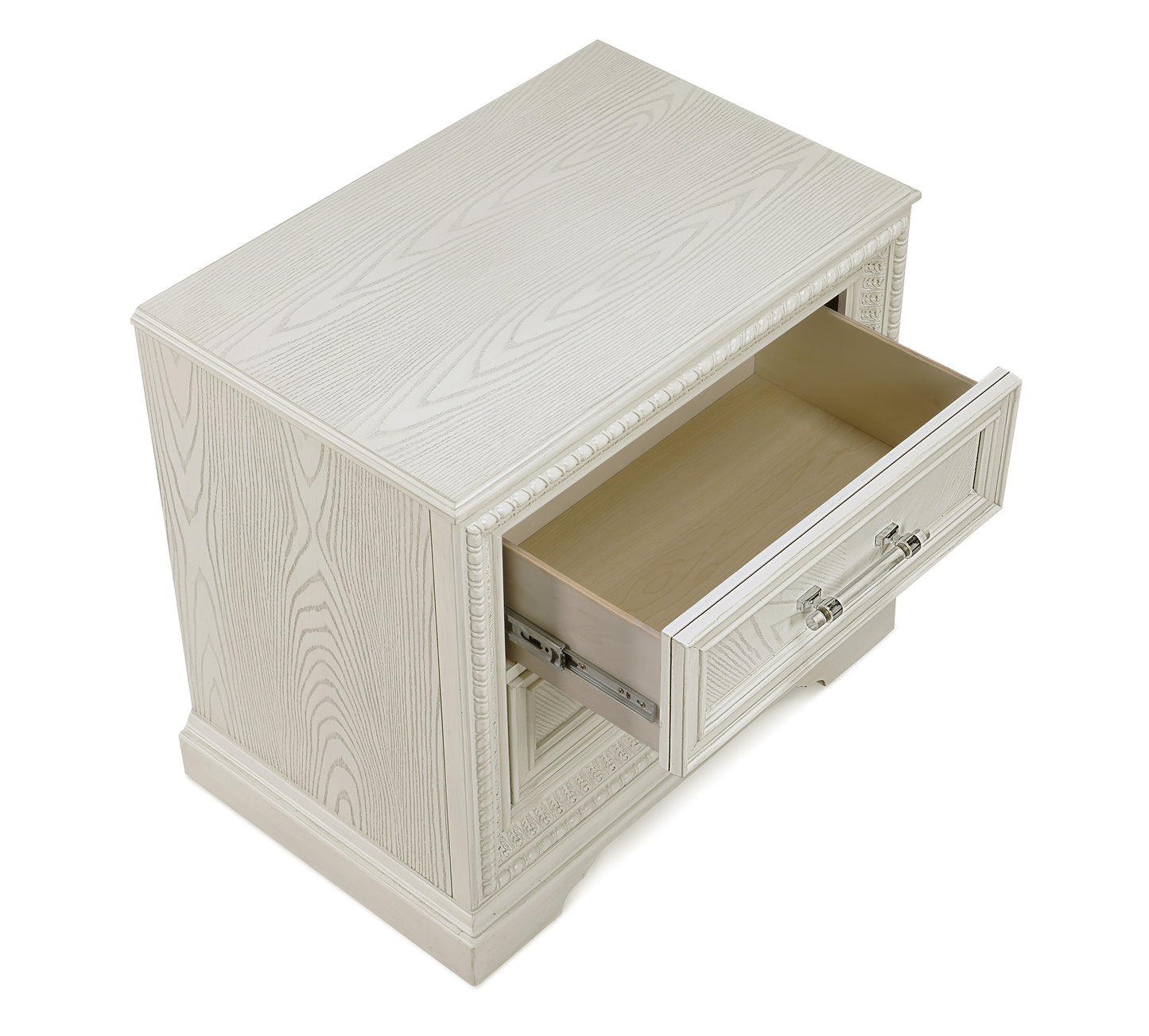 Elegant white wood nightstand with carved trim and one open drawer