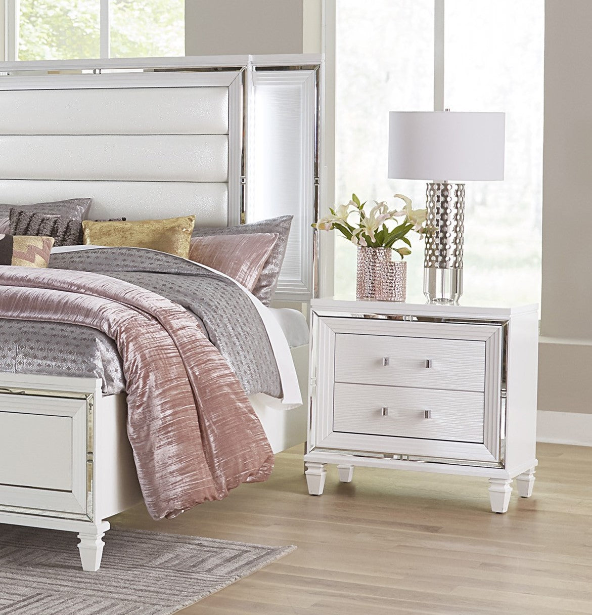 White upholstered headboard with mirrored trim