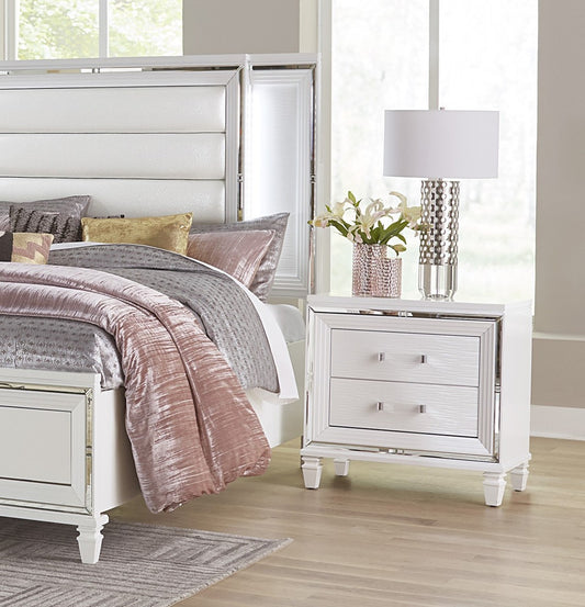 White upholstered headboard with mirrored trim