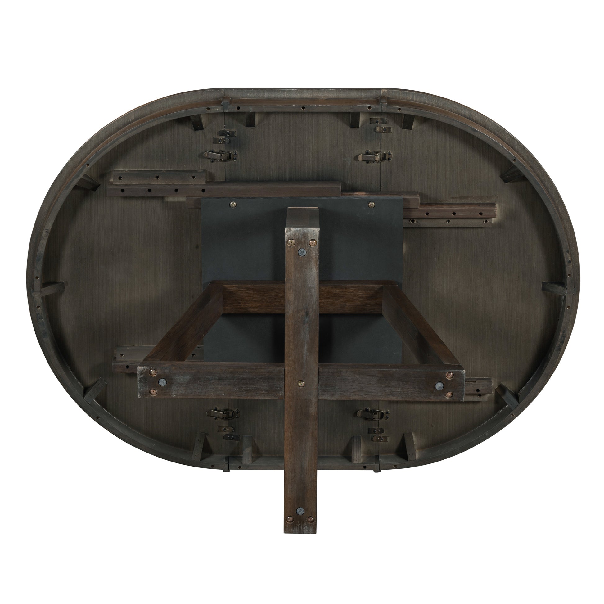 Underside of a dark wood round dining table with metal latches and support beams featuring extendable leaf mechanism