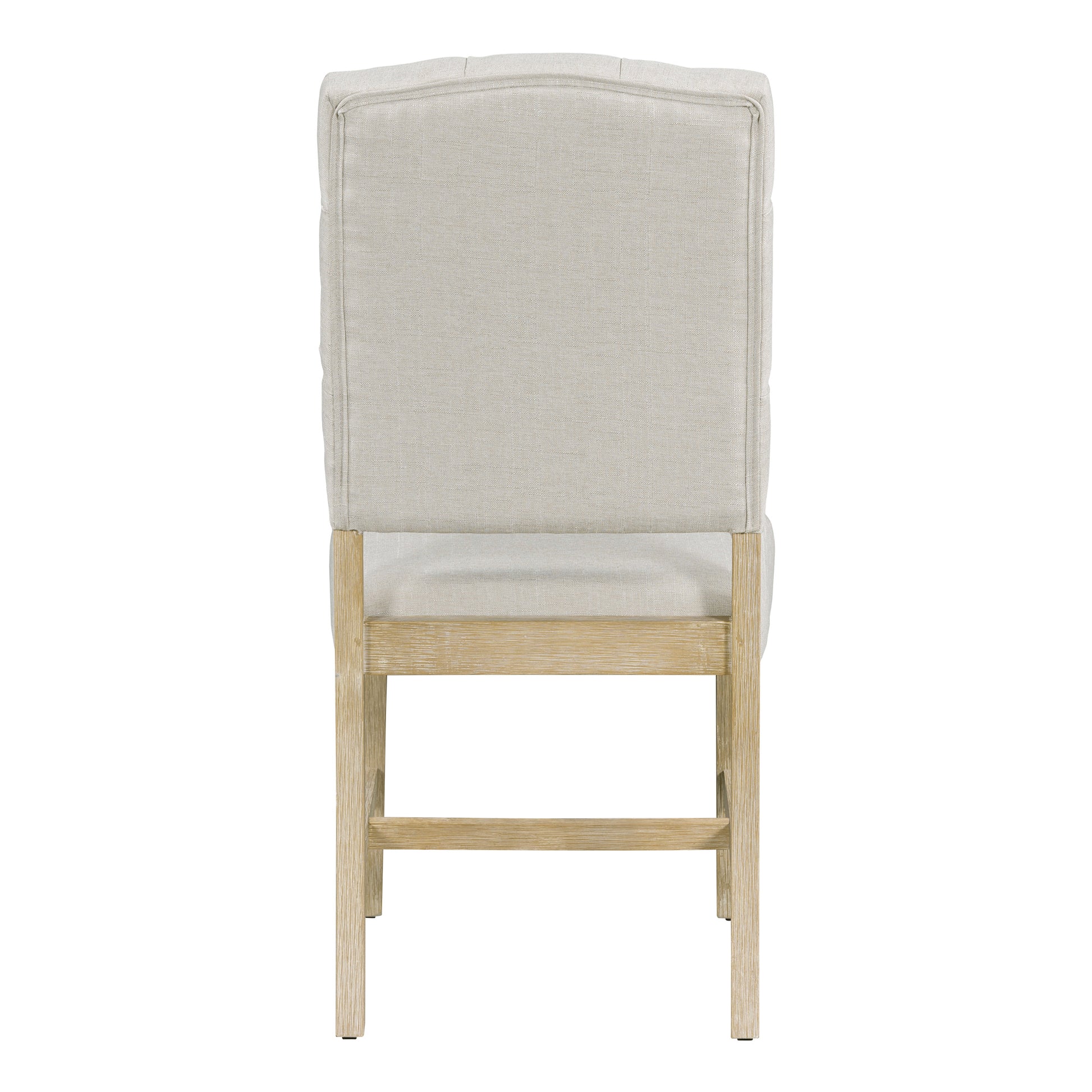 Back view of a tufted linen dining chair with a light wood frame
