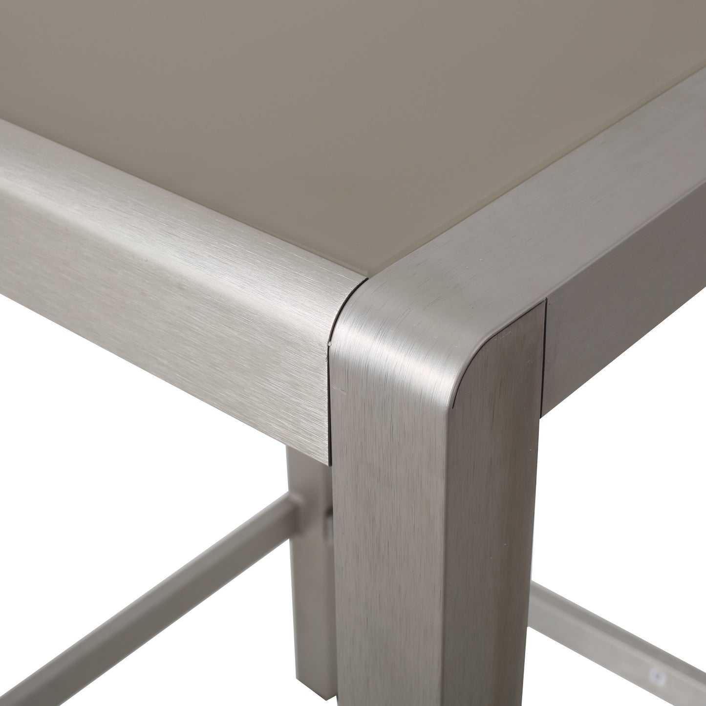 Brushed aluminum corner detail of a modern side table