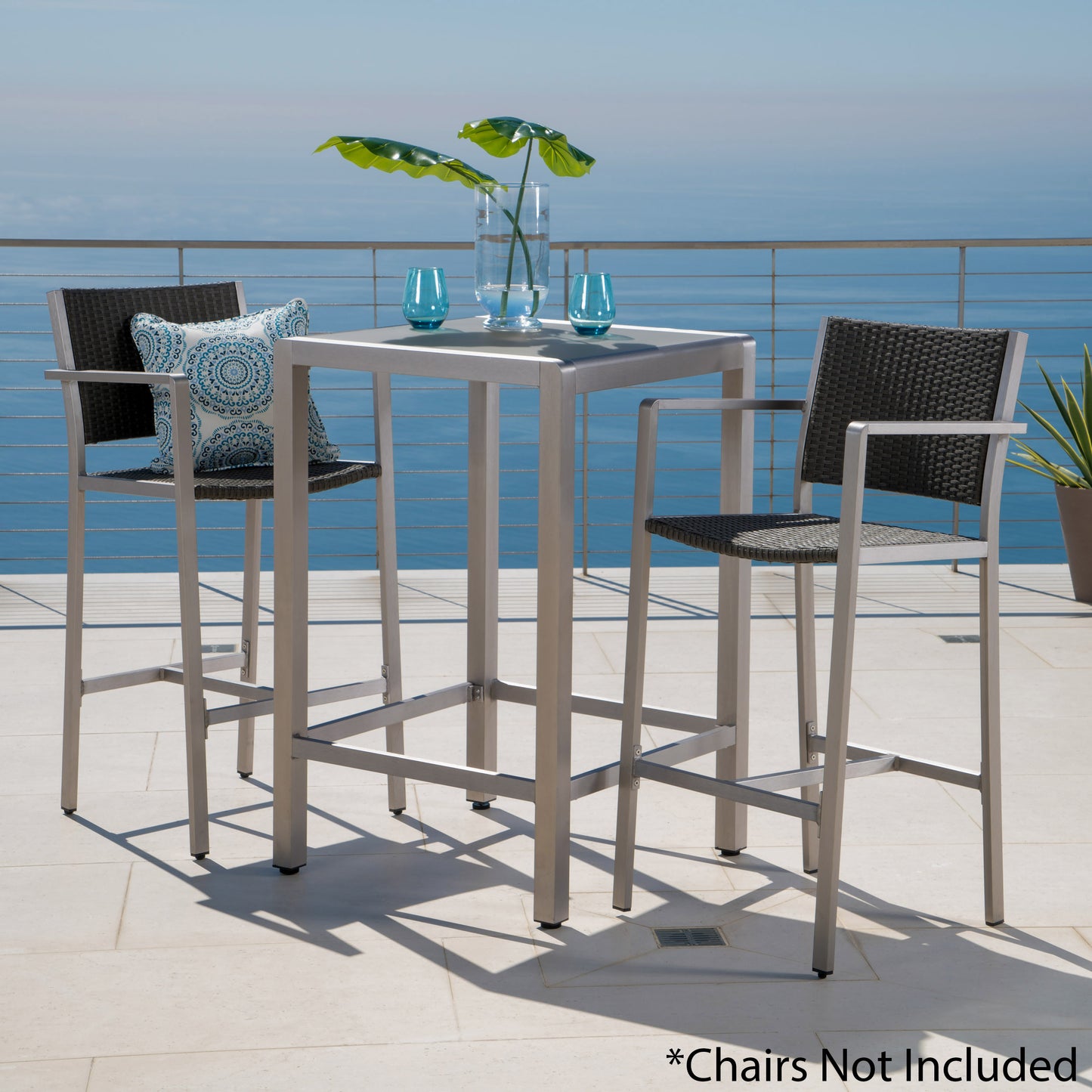 Silver aluminum outdoor bar table with dark grey woven accents
