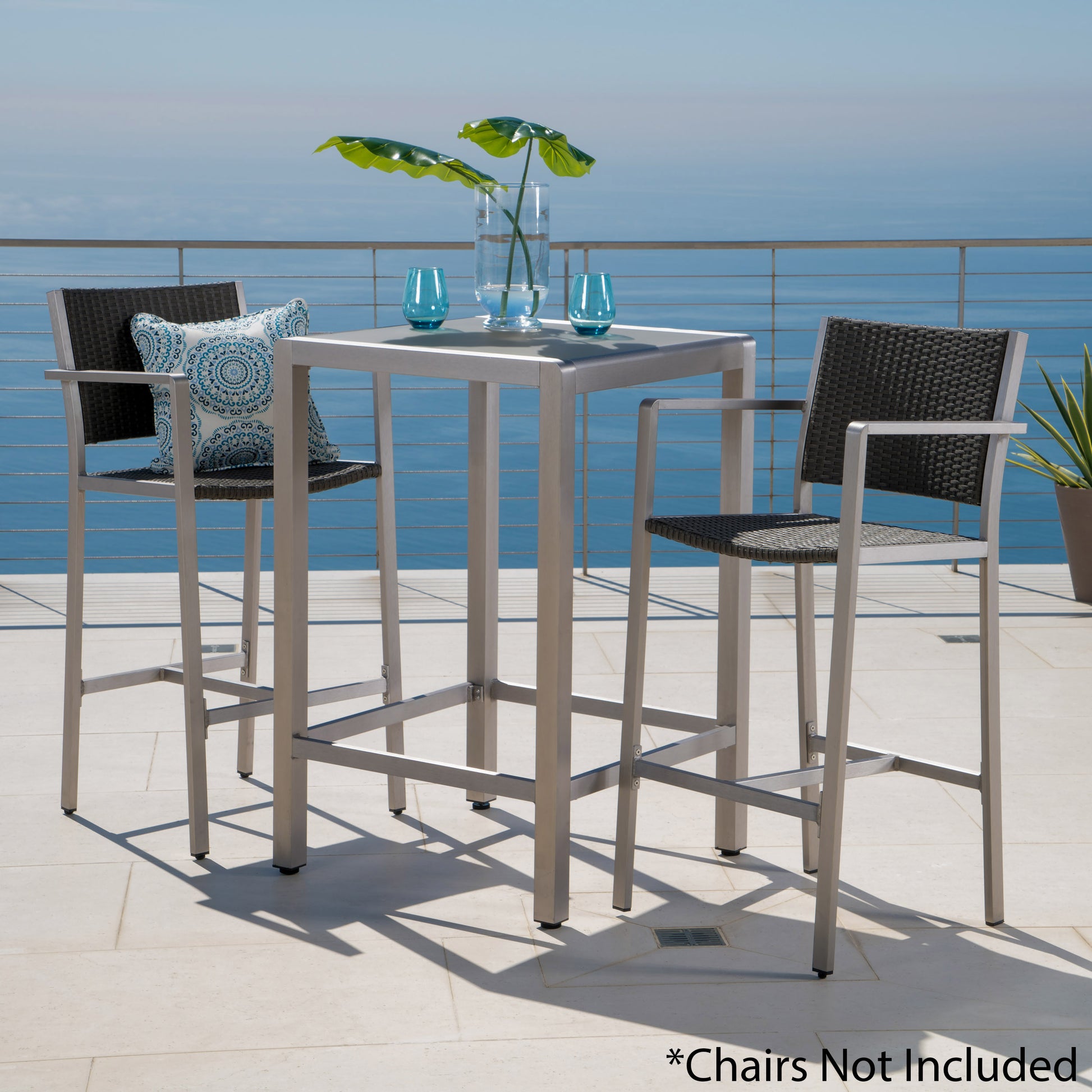 Silver aluminum outdoor bar table with dark grey woven accents