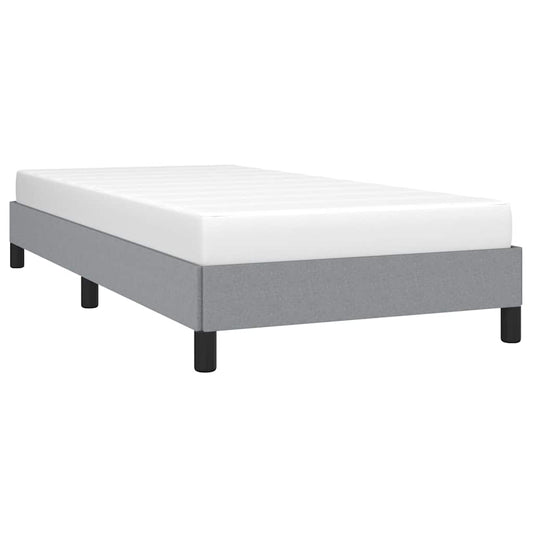 Gray upholstered twin bed frame with black legs