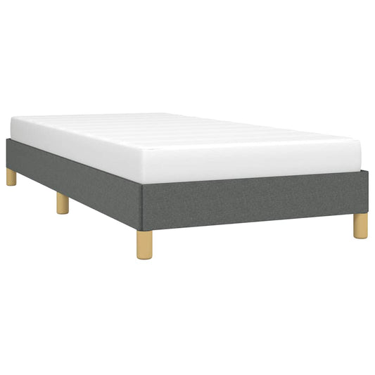 Grey upholstered twin bed frame with wooden legs