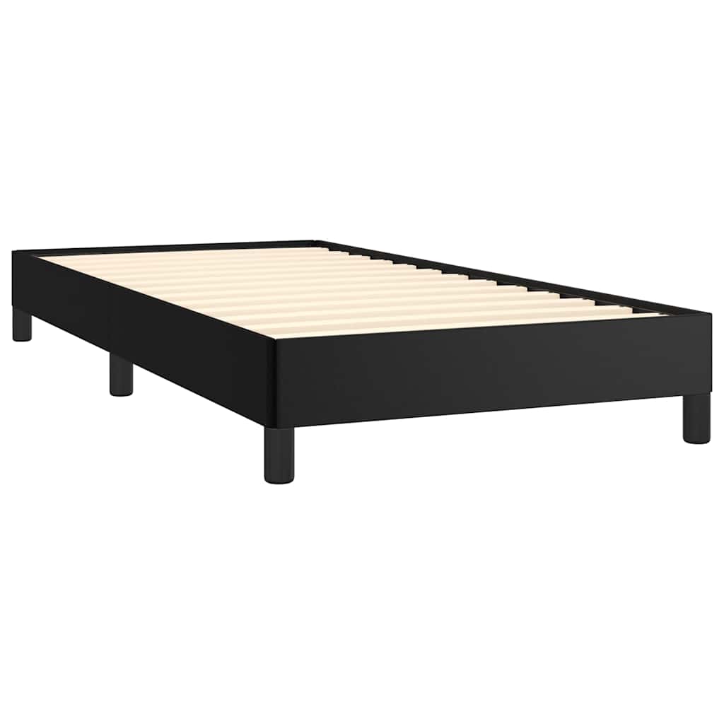 Black platform bed frame with white mattress