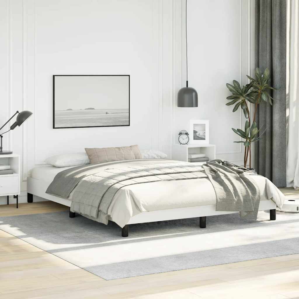 White upholstered bed frame with black legs