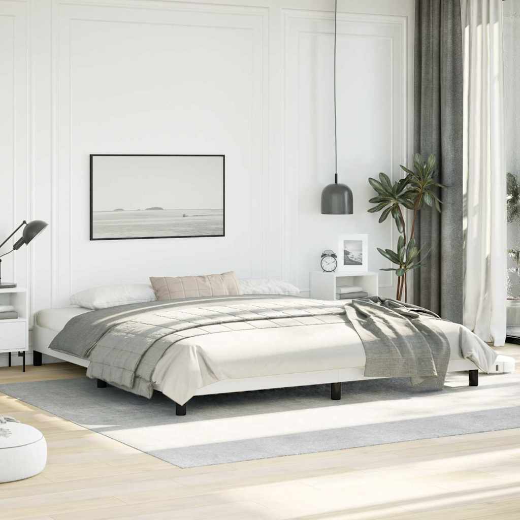 White platform bed frame with black legs