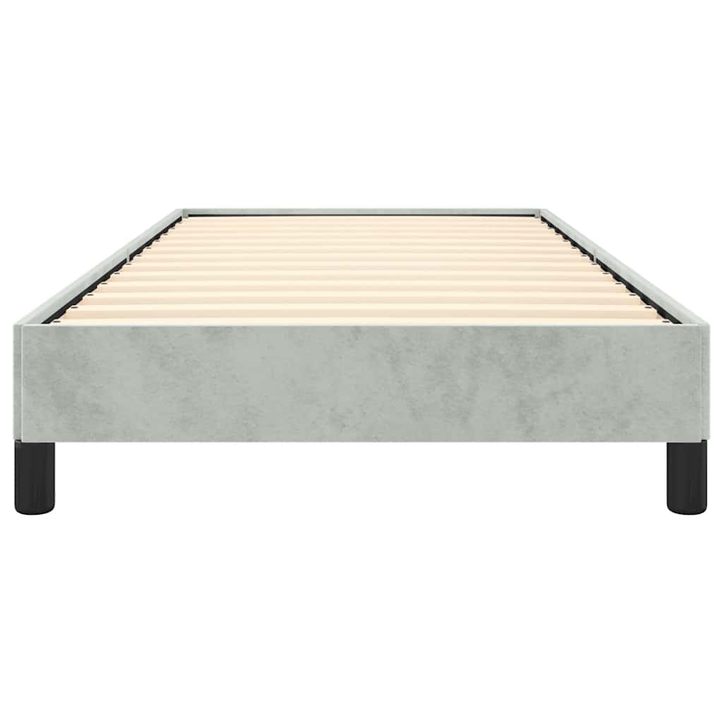 Twin size grey upholstered bed frame with black legs