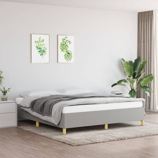 Modern gray upholstered platform bed frame with wooden legs