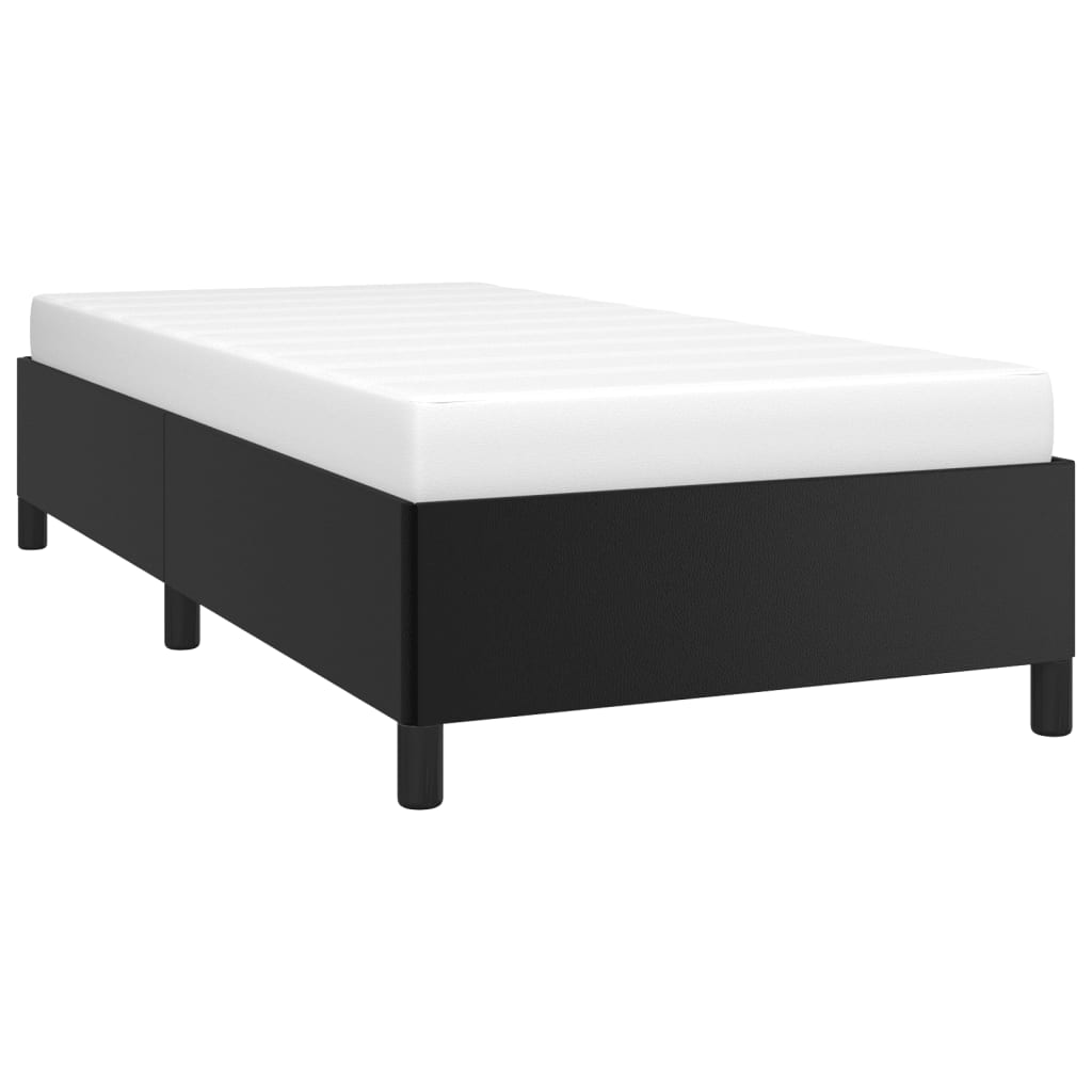 Modern black upholstered twin bed frame with white mattress