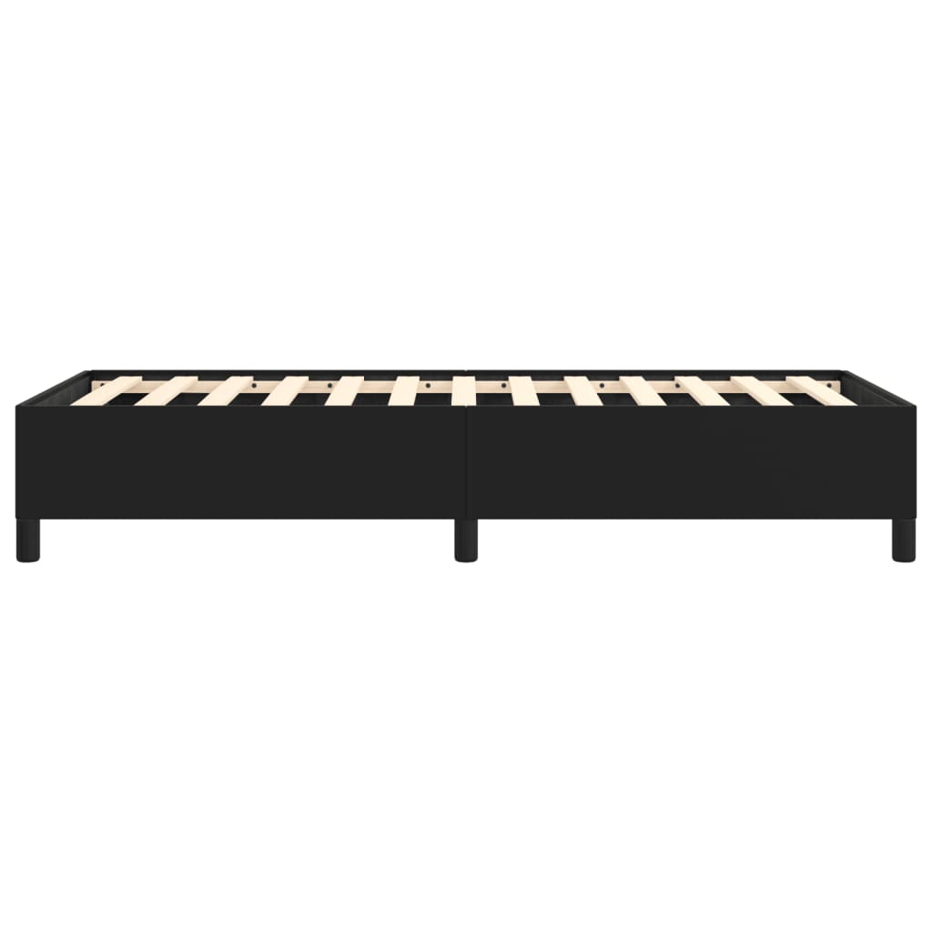 Black upholstered twin bed frame with wooden slats
