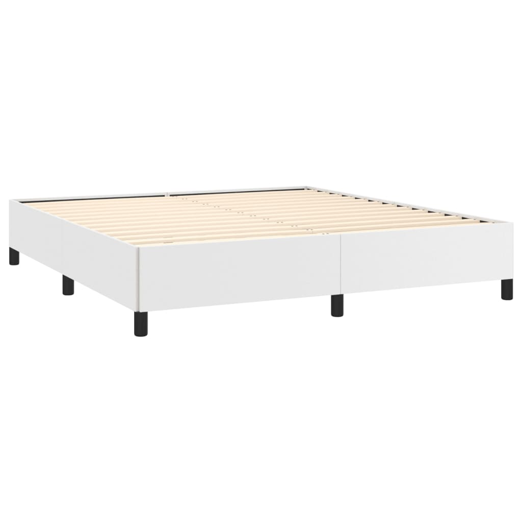 White upholstered platform bed frame with modern minimalist design