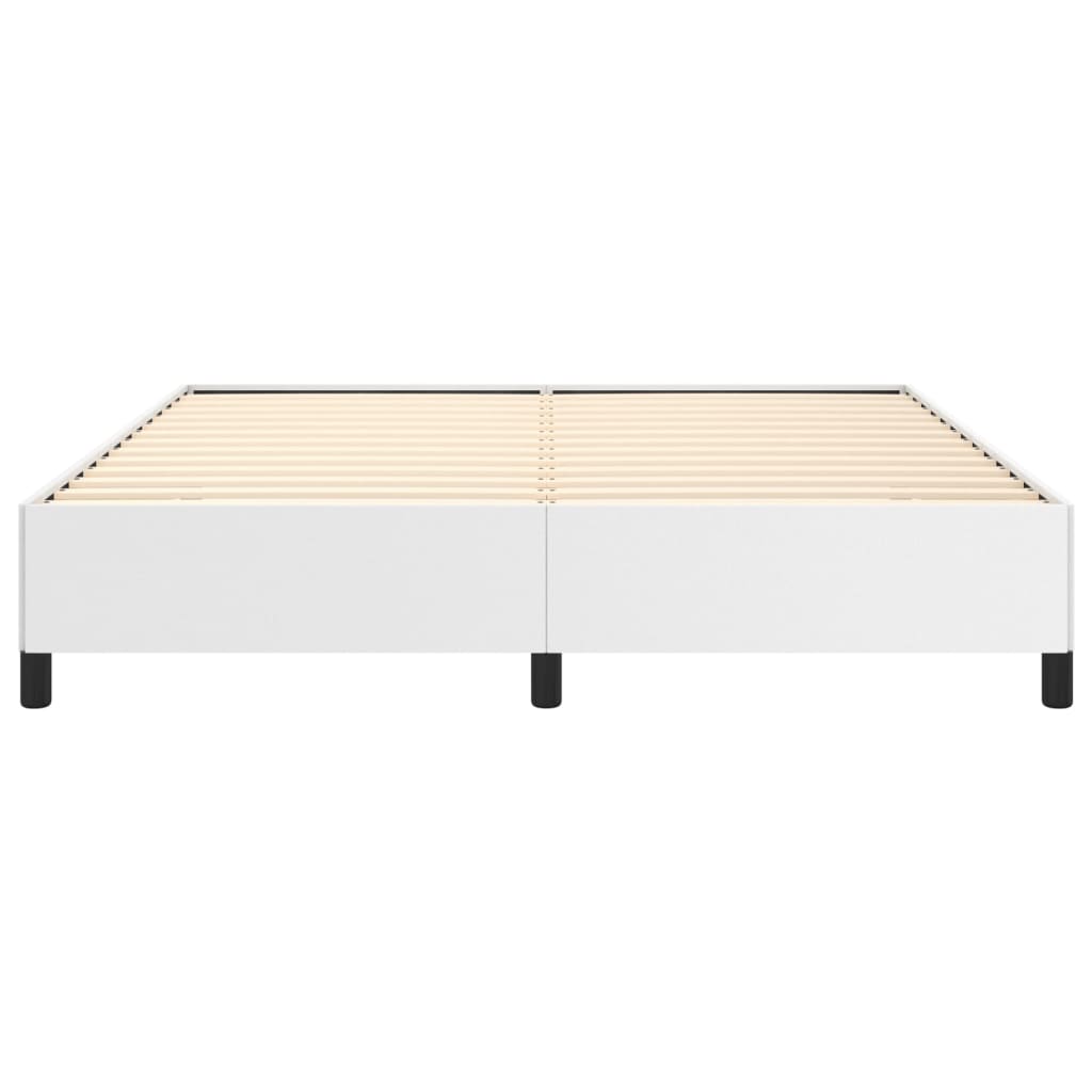 White upholstered platform bed frame with black legs