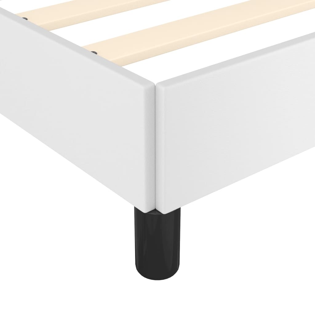 Modern white platform bed frame with wooden slats and black legs