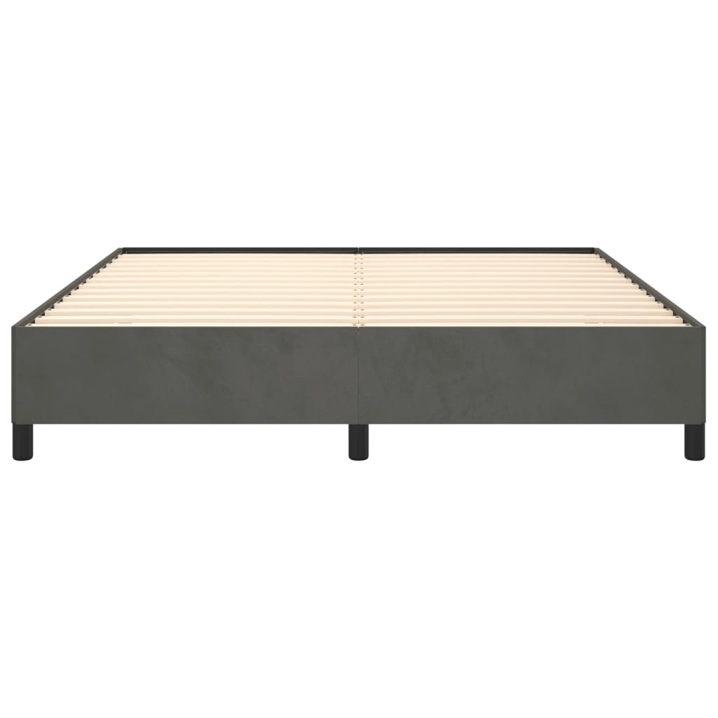 Gray upholstered platform bed frame with white mattress