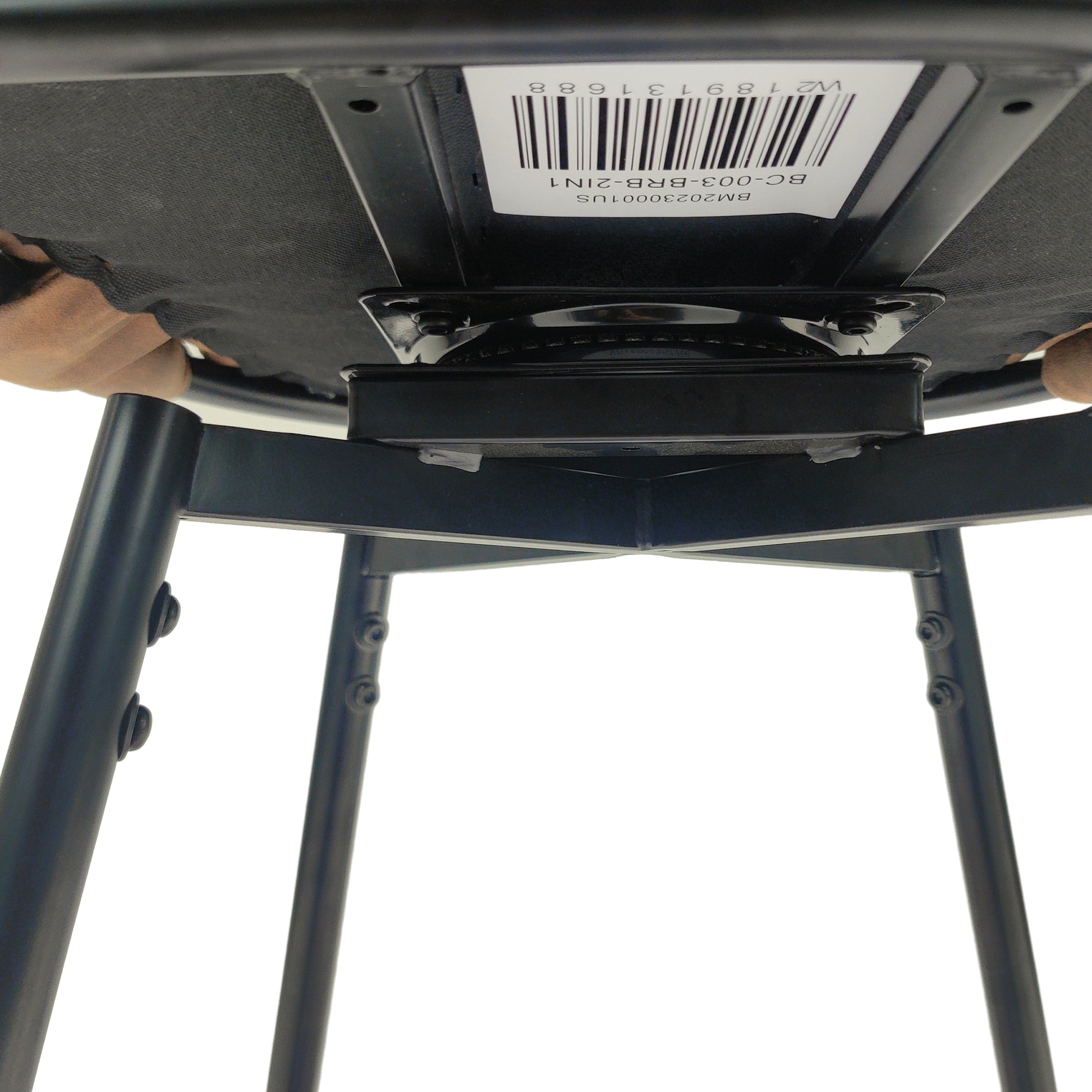 Underneath view of a black swivel stool base with brown seat edge