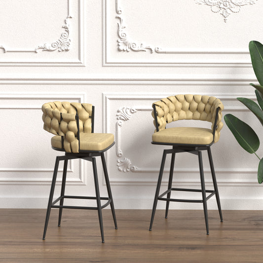 Pair of tufted beige swivel bar stools with black metal legs