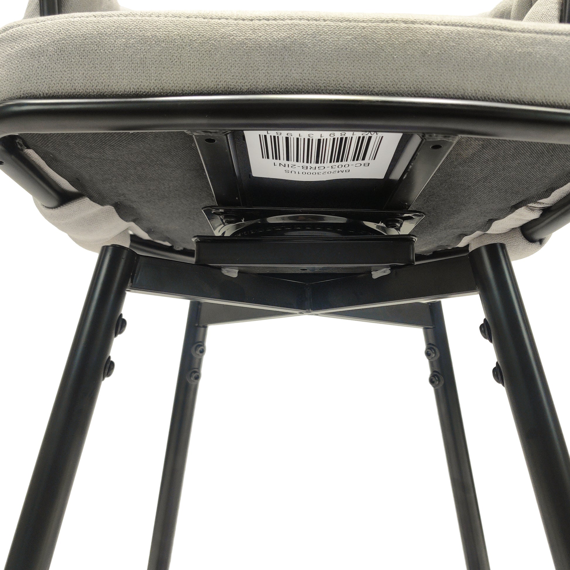 Closeup of underside of grey upholstered swivel stool with black metal legs and barcode