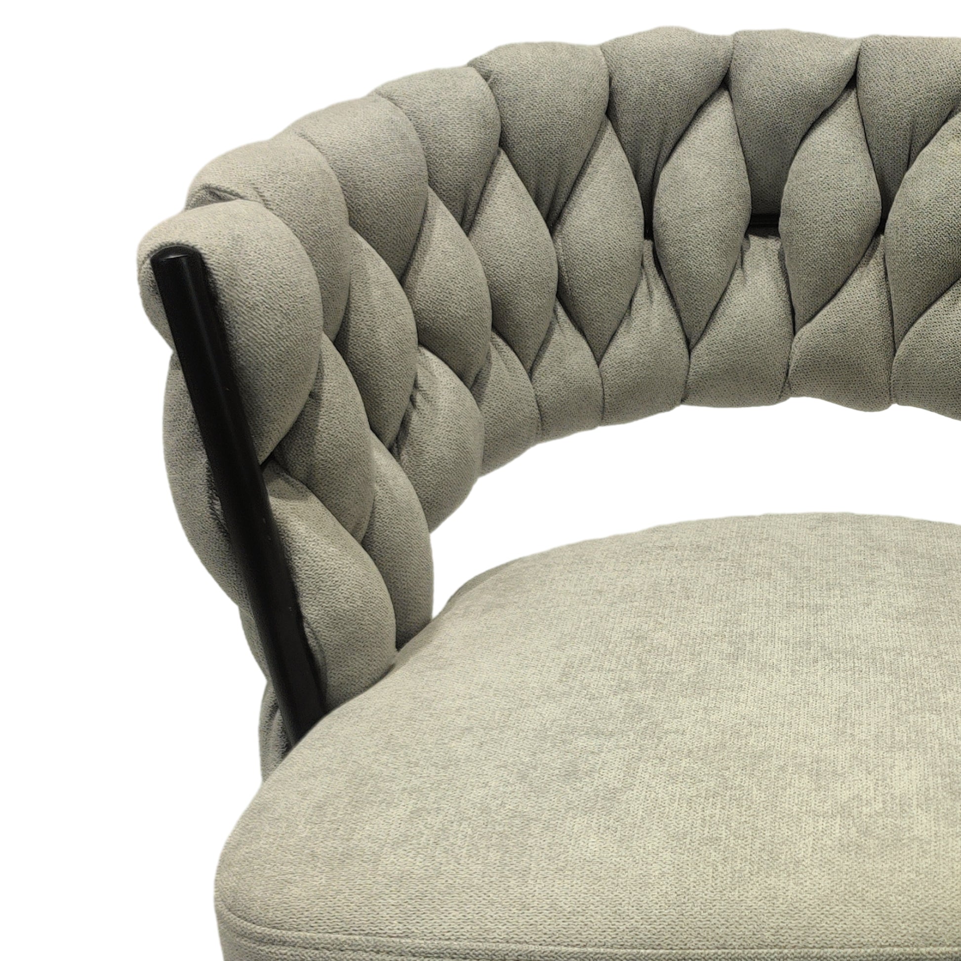 Grey upholstered accent chair with braided backrest and dark legs
