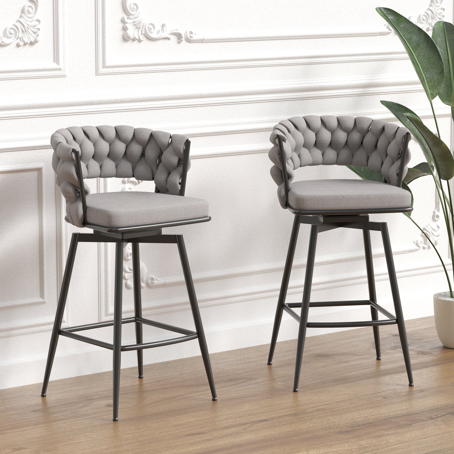 Gray upholstered swivel bar stool with a braided back and black metal legs