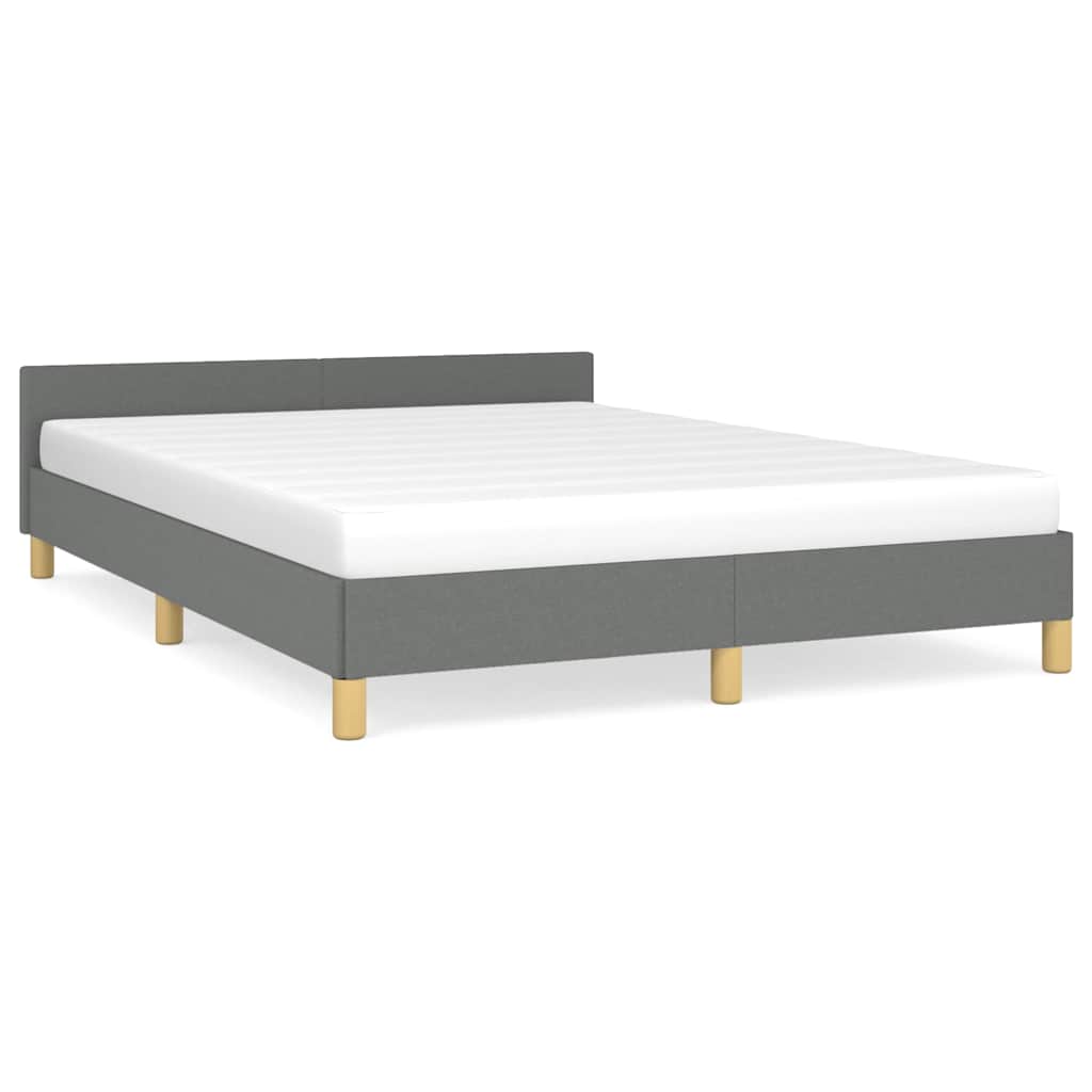King size platform bed frame with white upholstered headboard and wooden slats