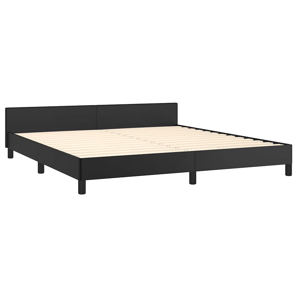 Modern black metal queen bed frame with white bedding and grey throw blanket