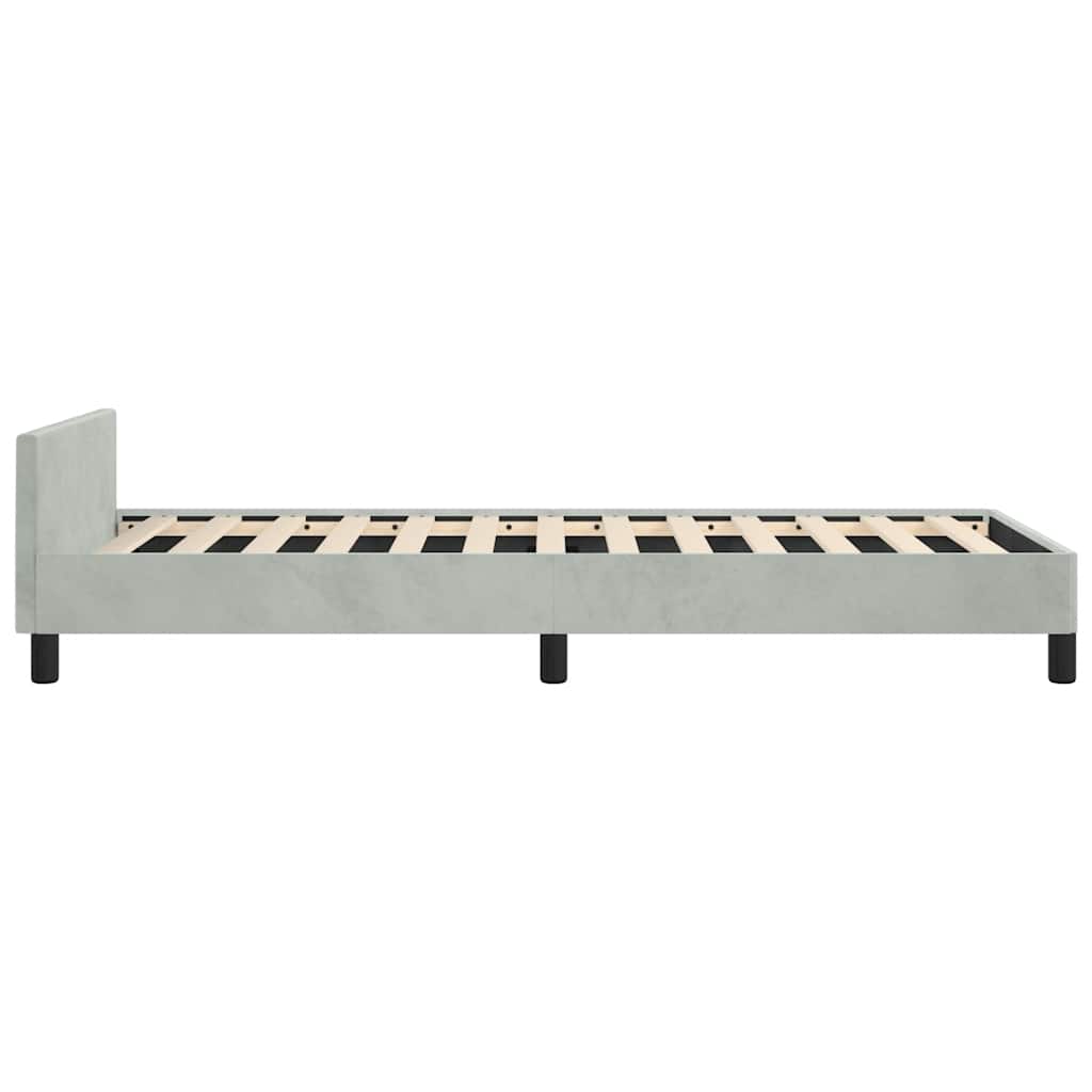 Light grey velvet upholstered single bed frame with black legs