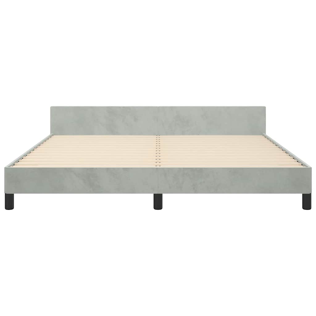 Modern upholstered bed frame in light green with black legs