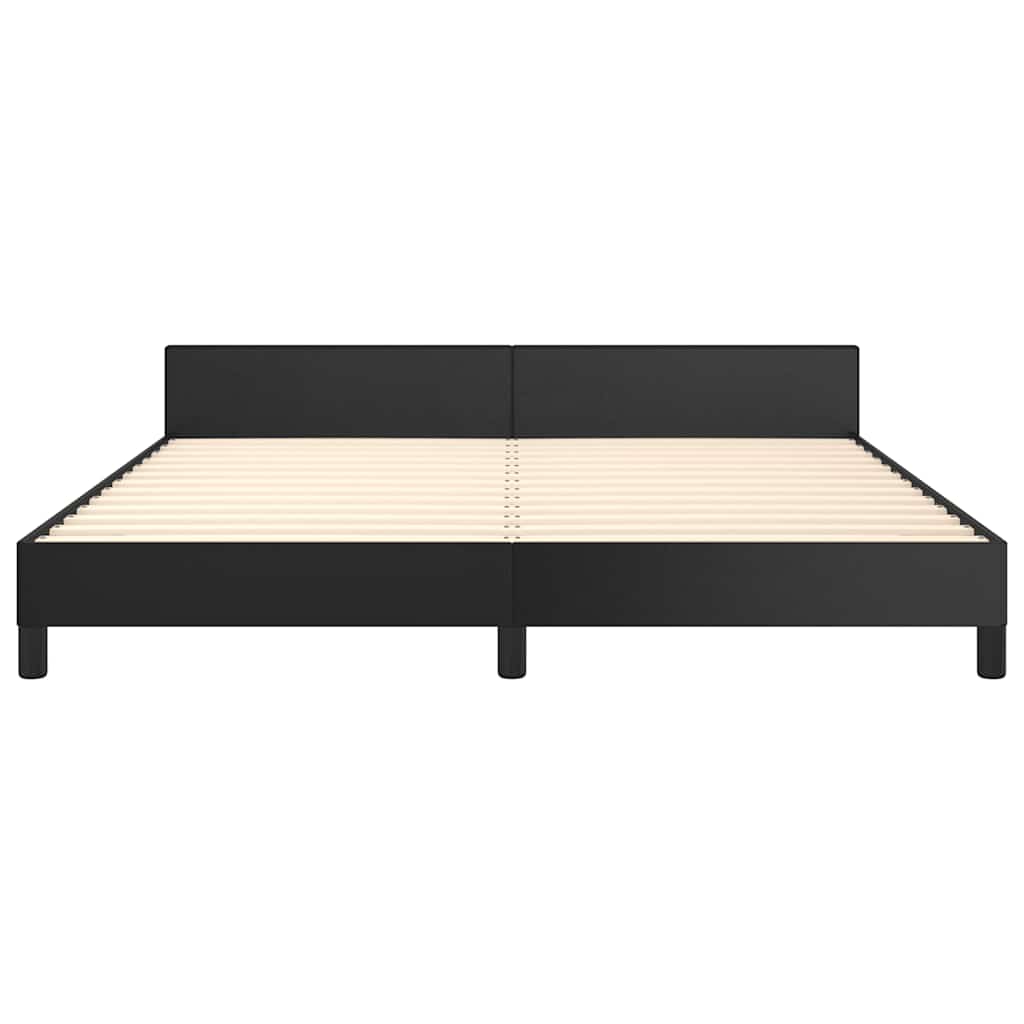 Modern black upholstered bed frame with a white mattress