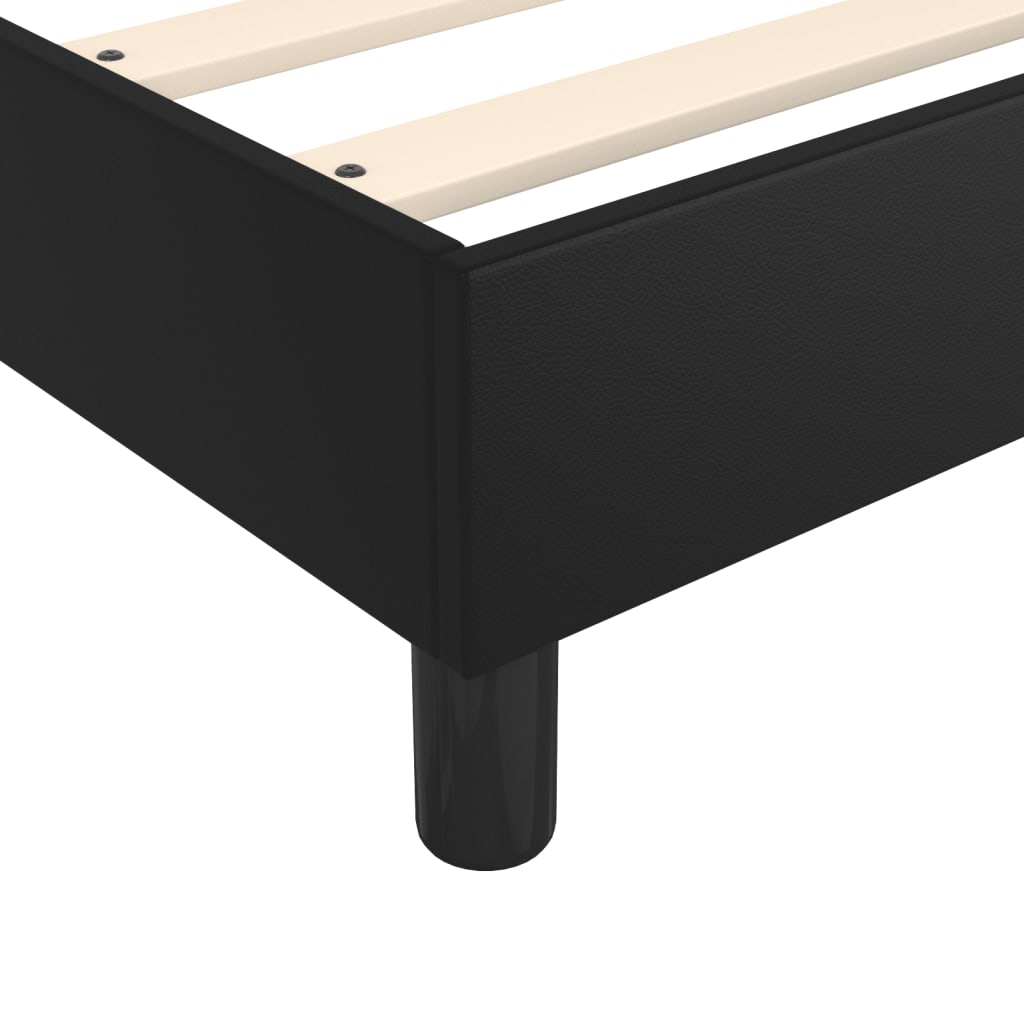 Black metal bed frame with wooden slats