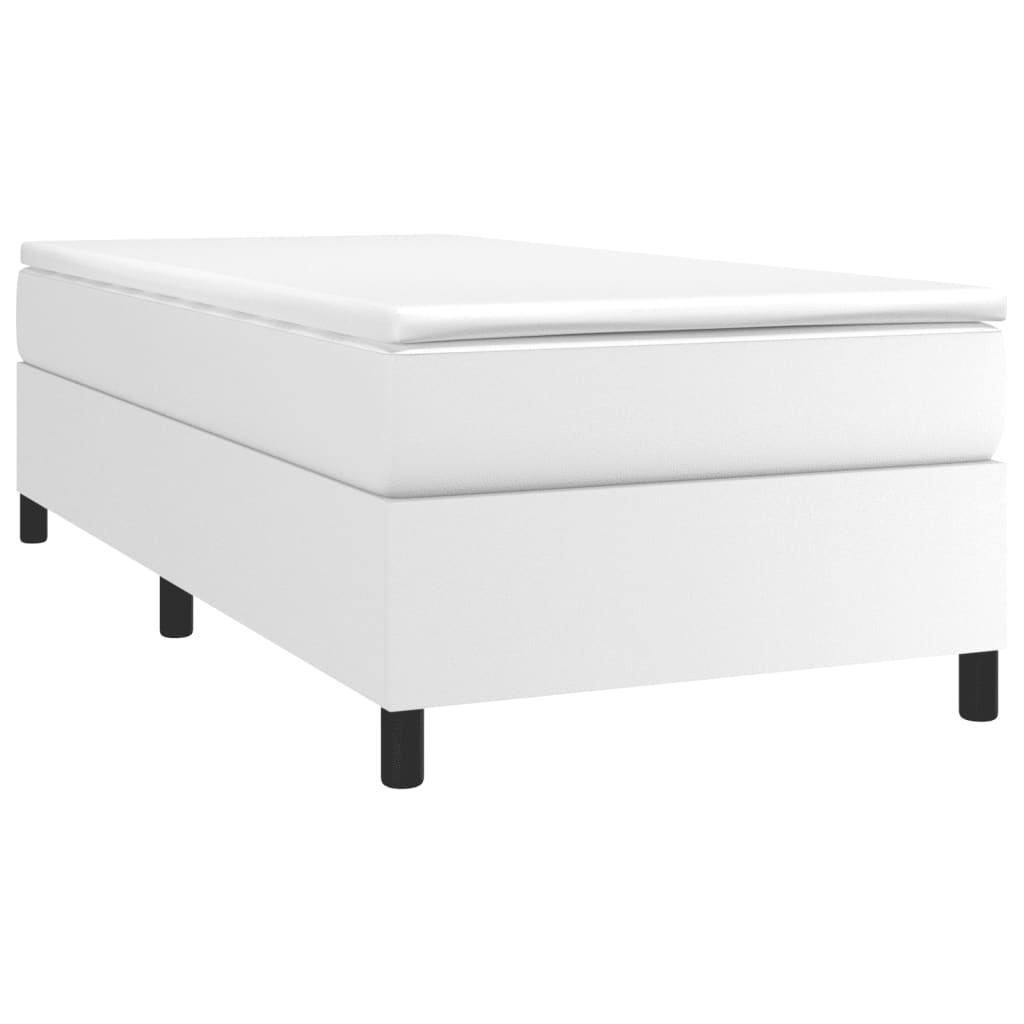 White upholstered divan bed with black legs