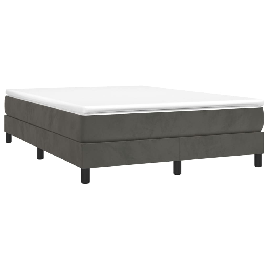 Charcoal grey upholstered bed frame with white mattress