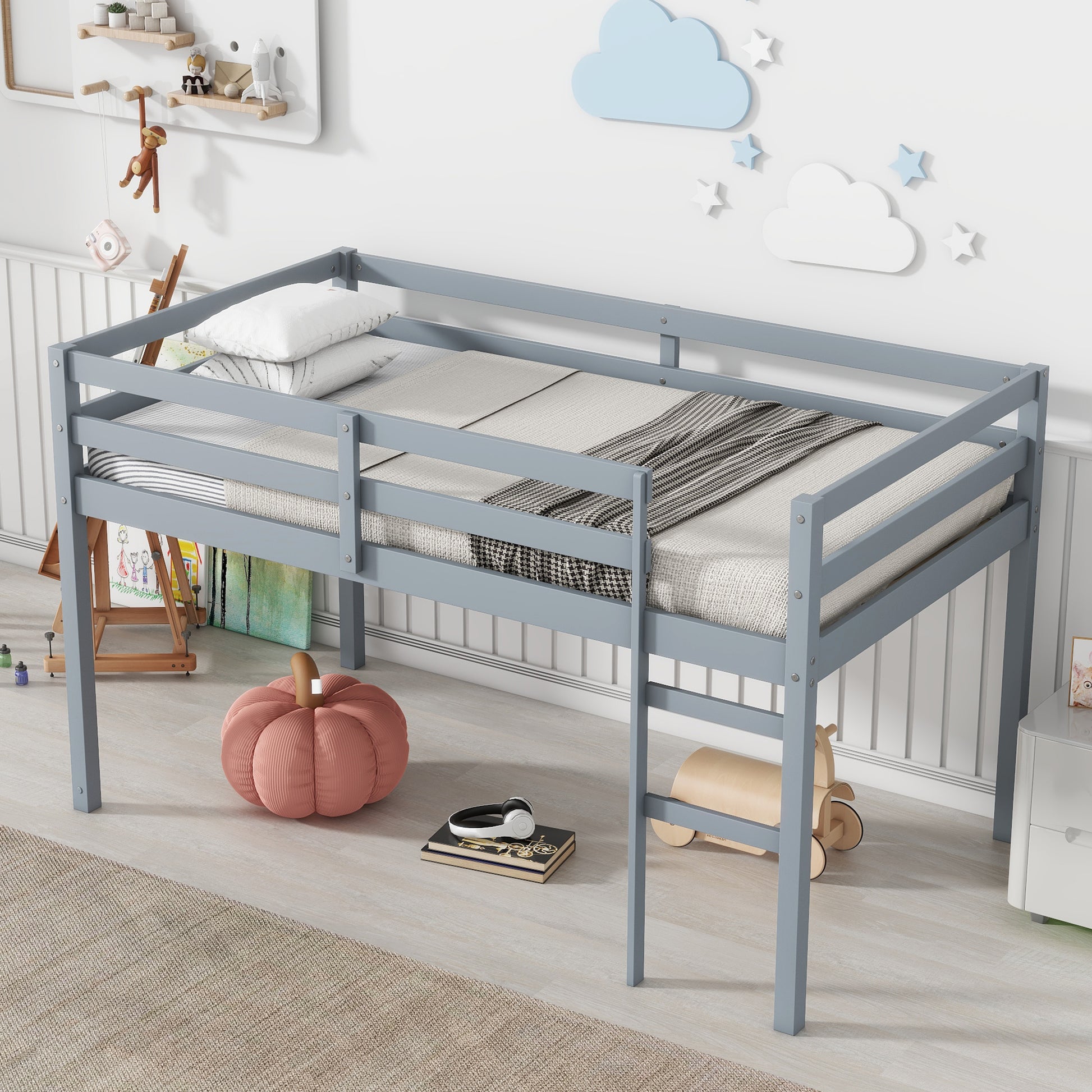 Gray wooden loft bed with guardrails and mattress