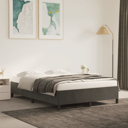 Gray upholstered queen bed frame with minimalist design featuring clean lines and sturdy wooden legs for a modern bedroom