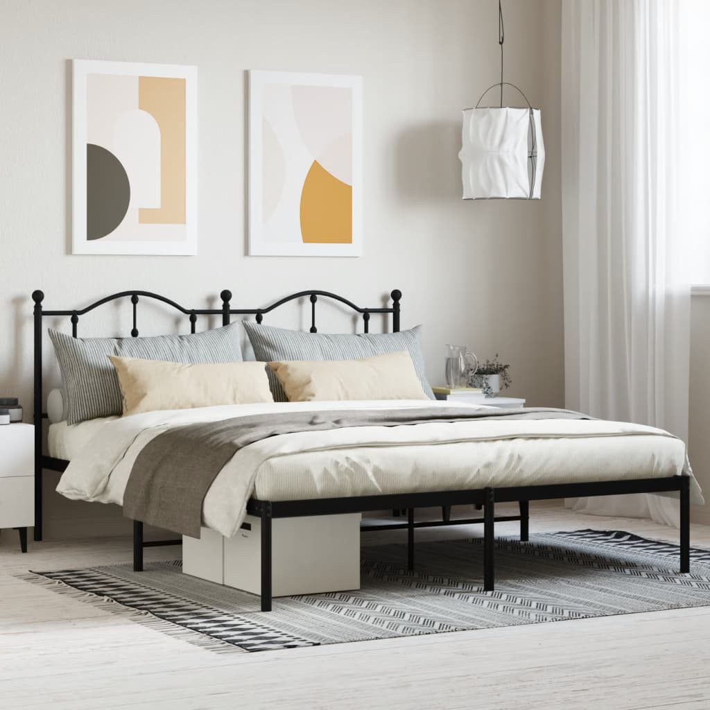 Ornate bronze metal bed frame with curved headboard and footboard