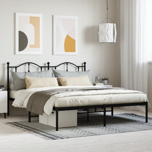 Ornate bronze metal bed frame with curved headboard and footboard
